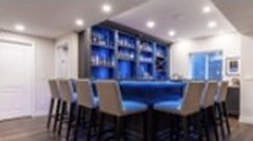 Basement wet bar and game room